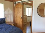 Beautiful sliding barn door to one of two upstairs bedrooms 